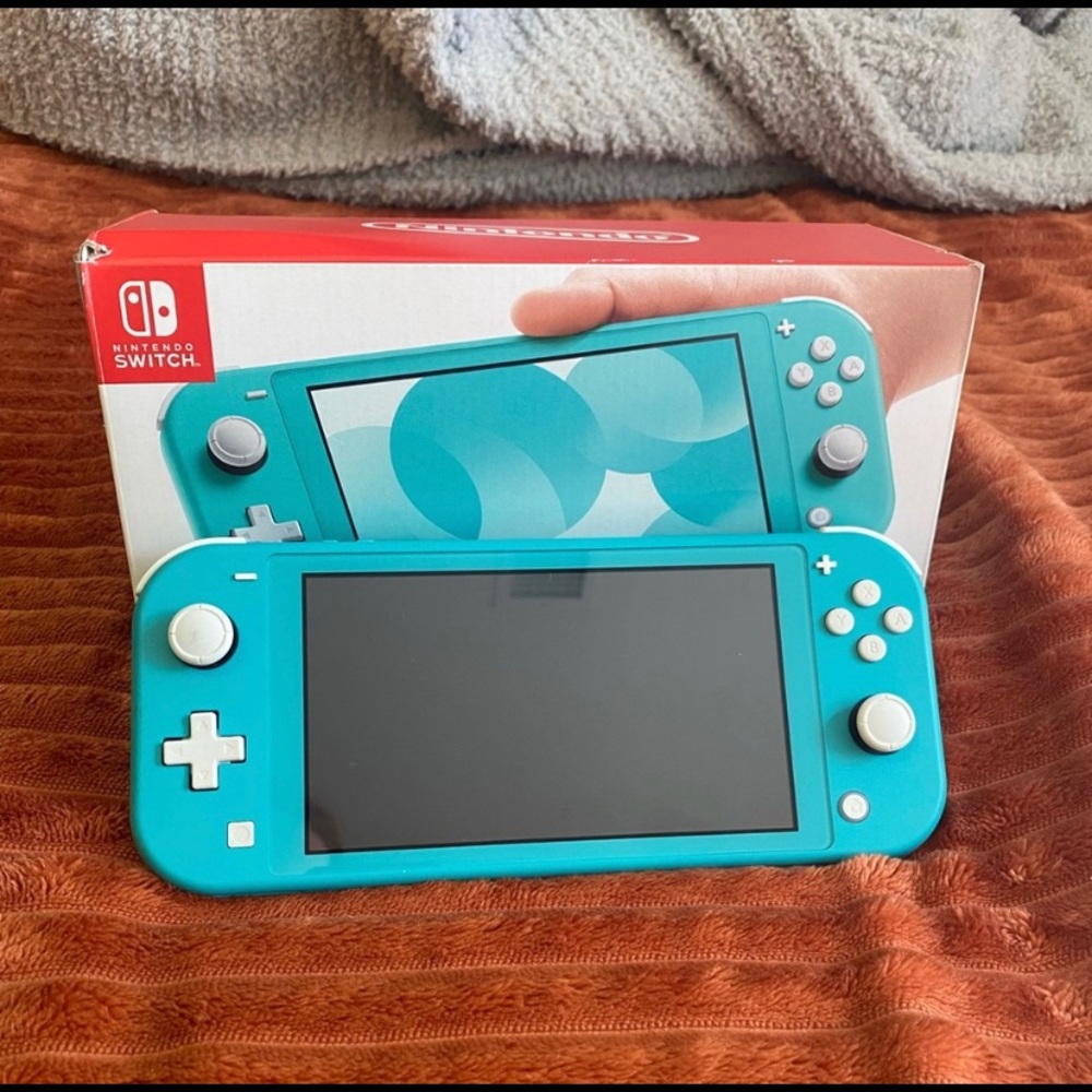 Nintendo Switch Lite in Turquoise (Lightly Used)
